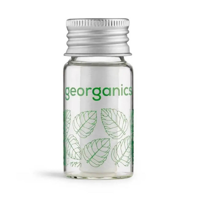 Glazen Georganics dispenser voor composteerbare tandzijde met groene opdruk