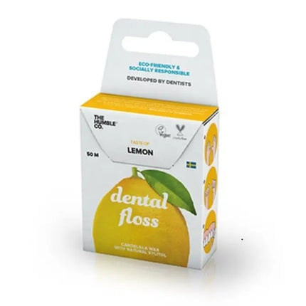 Detail van verpakking van The Humble Co. flosdraad met citroensmaak – gerecycled karton, vegan en ontwikkeld door tandartsen, met afbeelding van een citroen