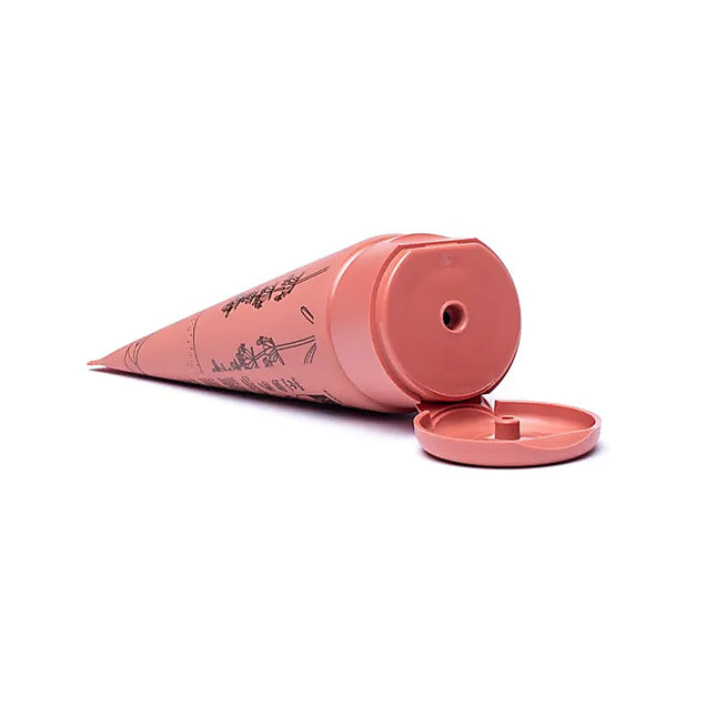 Najel Eastern Softness BIO gezichtsscrub met open dop, roze tube met zwarte illustraties,