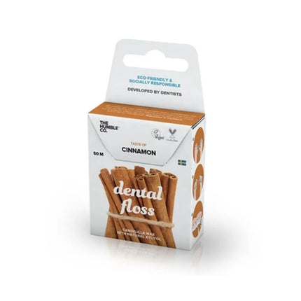 Flosdraad met kaneelsmaak in een kartonnen dispenser